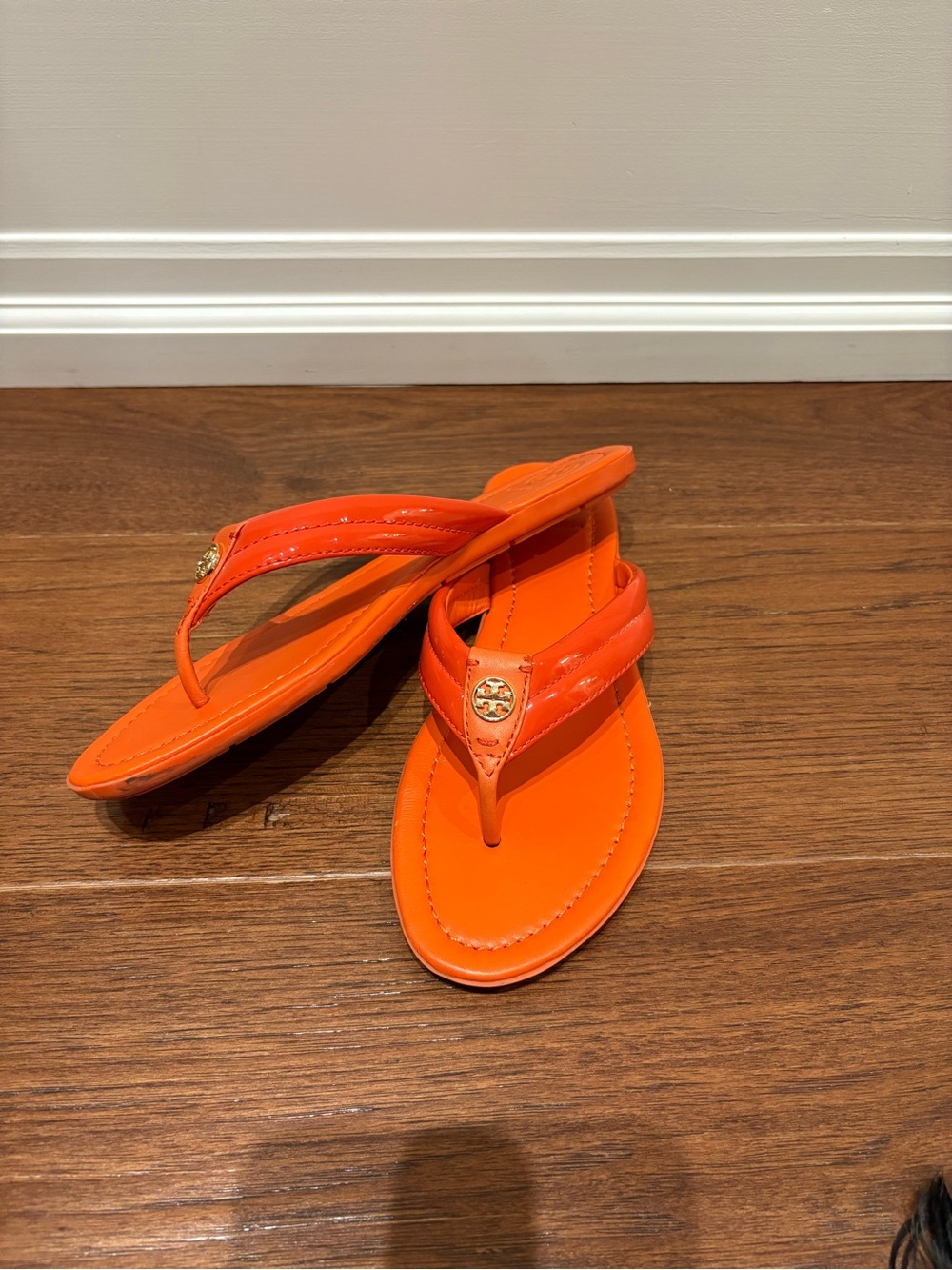 Tory Burch Bright Orange Patent Thong Sandals with Gold Logo